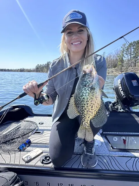 Nicole Stone holding a crappie with a St. Croix panfish rod