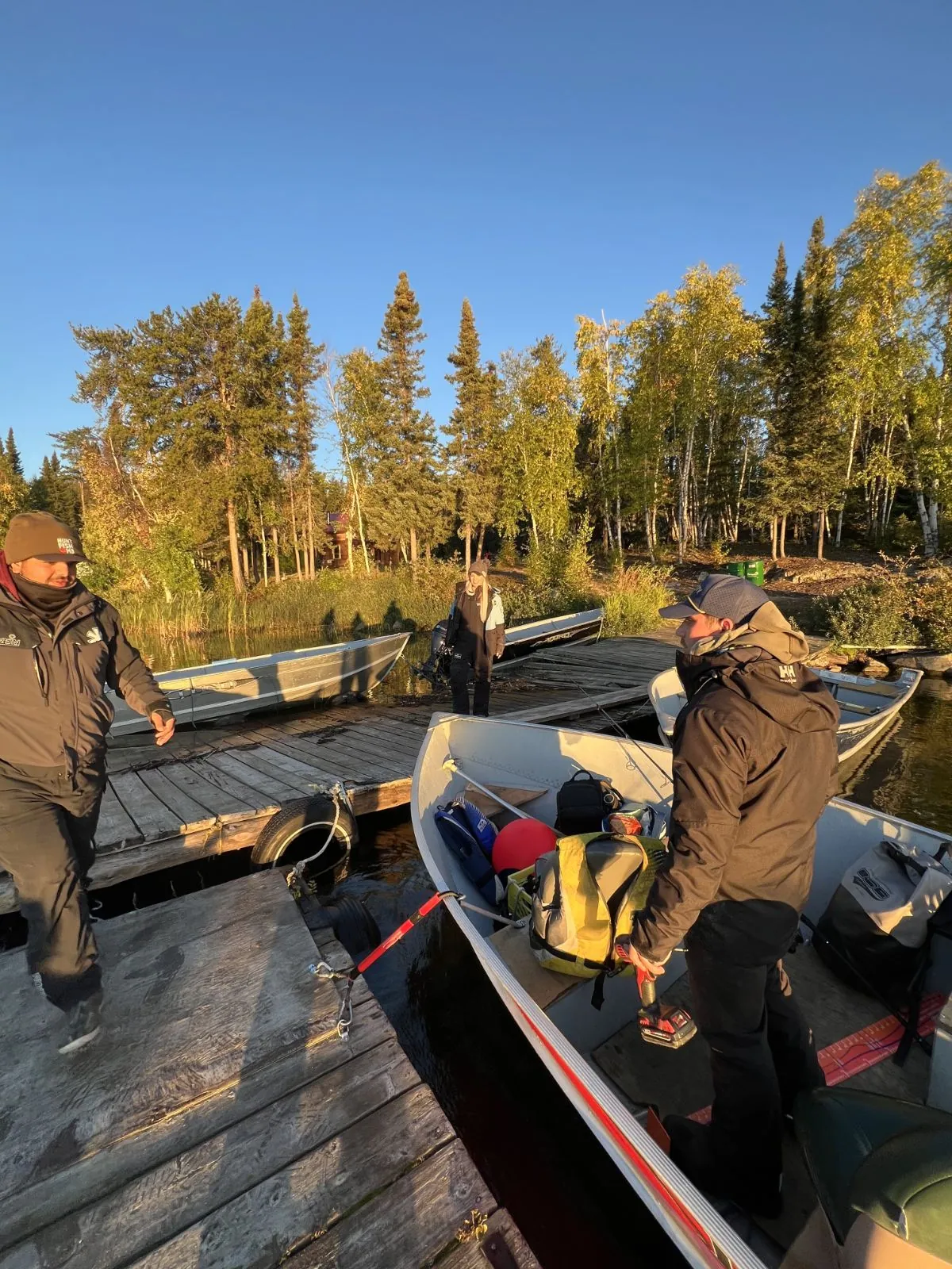 Loading the boats at the dock for a morning of trophy lake trout fishing on Kamuchawie Lake